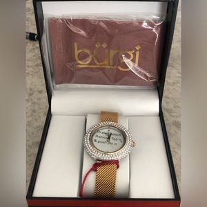 New in box women’s Burgi watch with Swarovski crystals.